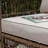 Vivek Premium All-Weather Wicker 2 - Person Patio Conversation Set with Cushions