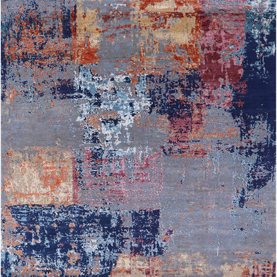 Tapis rouge / bleu à motif abstrait Breesport