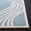 Tapis ivoire / bleu en laine touffeté à la main Deedie-22809418