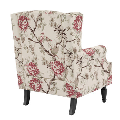  Fauteuil à oreilles tapissier à garniture cloutée beige Duward
