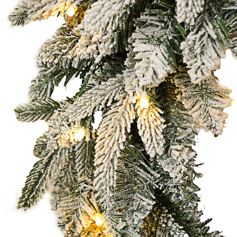 Couronne de Noël floquée avec guirlande de Noël et arbre de Noël