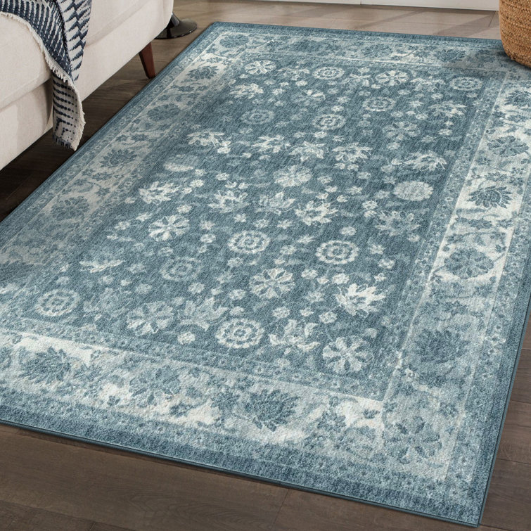Tapis bleu à motif floral Manasi