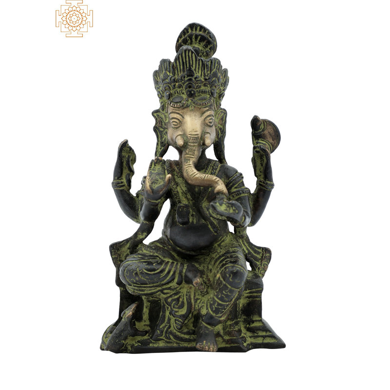 Figurine Ganesha mangeant Modaka