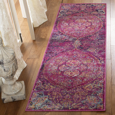 Tapis oriental fuchsia / mauve