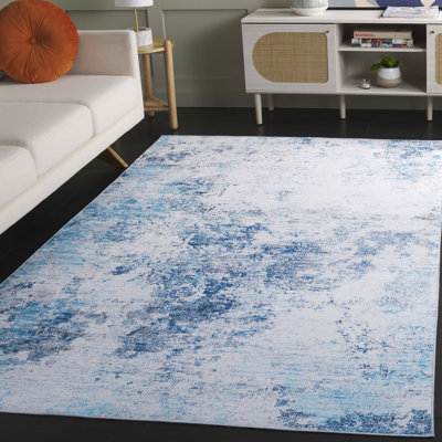 Zayd Abstract Machine Woven Polyester Area Rug in Beige / Turquoise