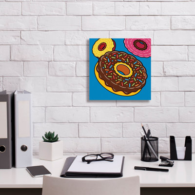 «Donuts On Blue On Canvas» par Ron Magnes, reproduction