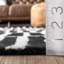 Tapis noir / ivoire / crème en laine fabriqué à la main à motif géométrique Odalis-397670958