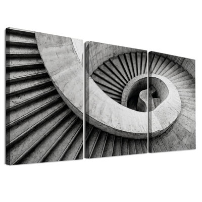 Ensemble de 3 toiles murales représentant un escalier en colimaçon en béton noir et blanc