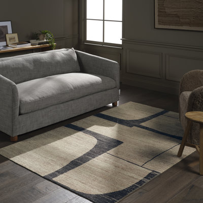 Theo Handwoven Abstract Tan Area Rug Made with Sustainable Materials