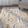 Tapis intérieur/extérieur bleu/jaune floral Lewis