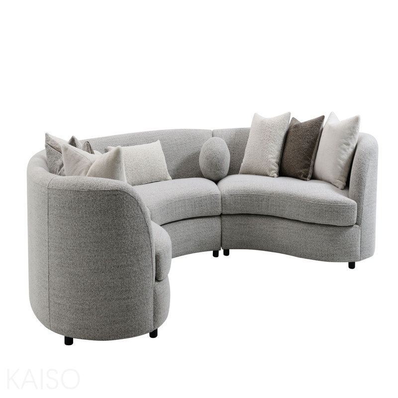Canapé modulaire gris avec 9 coussins
