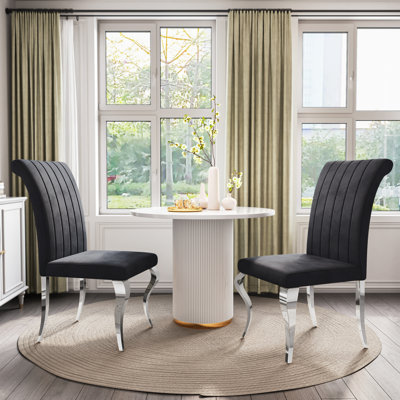 Chaise rembourrée en velours Meritza 