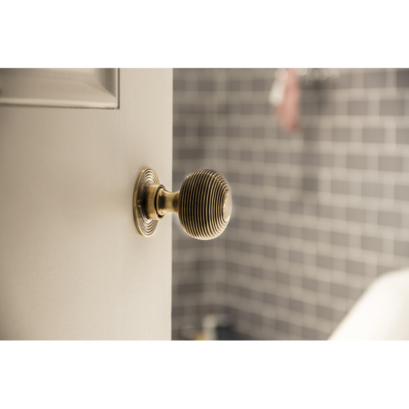 Beehive Passage Door Knob, Aged Brass