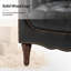 Fauteuil en cuir capitonné Annja-87636159