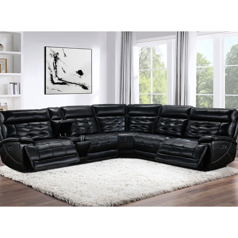 Canapé d'angle électrique double en cuir noir, avec surpiqûres contrastées et console de rangement pour recharger les appareils. Créez une ambiance lounge relaxante grâce à son siège inclinable en cuir pleine fleur noir. Un véritable cocon de confort.