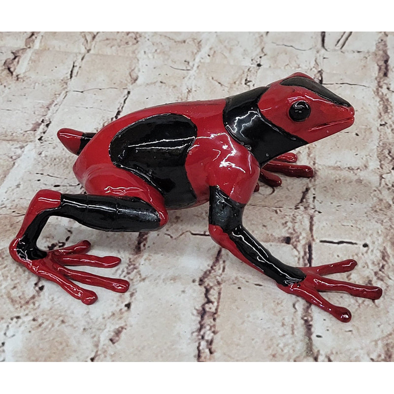 Figurine de grenouille rouge et noire