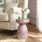 Iridescent Glass Accent Table with Artistic Design and Sturdy Base.