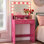Bureau de meuble-lavabo rose avec miroir, 11 ampoules de style, 2 niveaux de rangement, 3 modes d'éclairage pour l'éclairage de la coiffeuse de chambre à coucher, tiroirs, configuration soignée