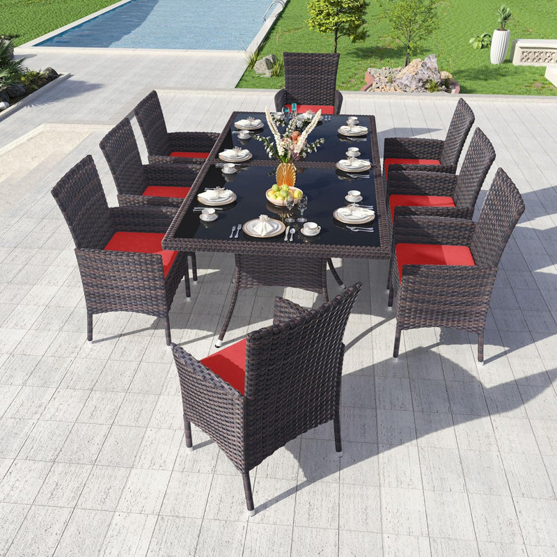 Hemraj 10-Piece Outdoor Dining Set Rattan Chairs With Cushions And Matching Glass-Top Tables, Red