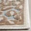 Banerjee Animal Print Area Rug in Stone/Aqua-778425403