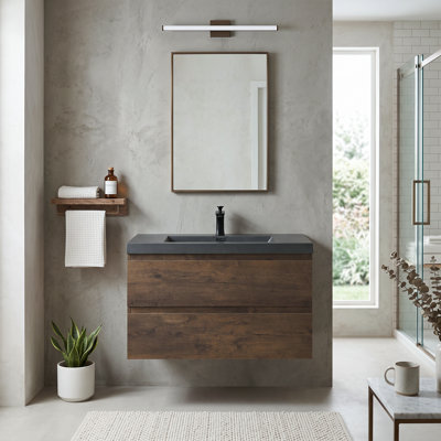 Meuble-lavabo suspendu de 75 cm (29,53 po) en mélamine avec lavabo intégré en résine et portes à fermeture amortie, entièrement assemblé.
