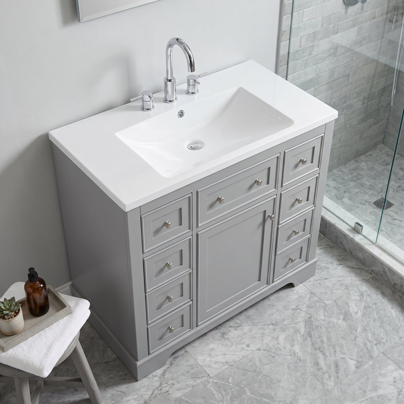Meuble-lavabo moderne autoportant de 91 cm (36 po) en bois massif et MDF, avec lavabo en céramique intégré, 6 tiroirs, garde-robe, tablette réglable et quincaillerie complète.