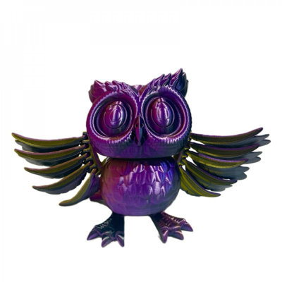 Figurine mauve à imprimé 3D mauve avec ailes d'or