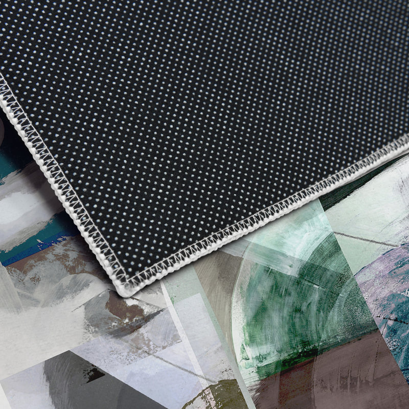 Tapis rectangulaire Divyan avec envers antidérapant