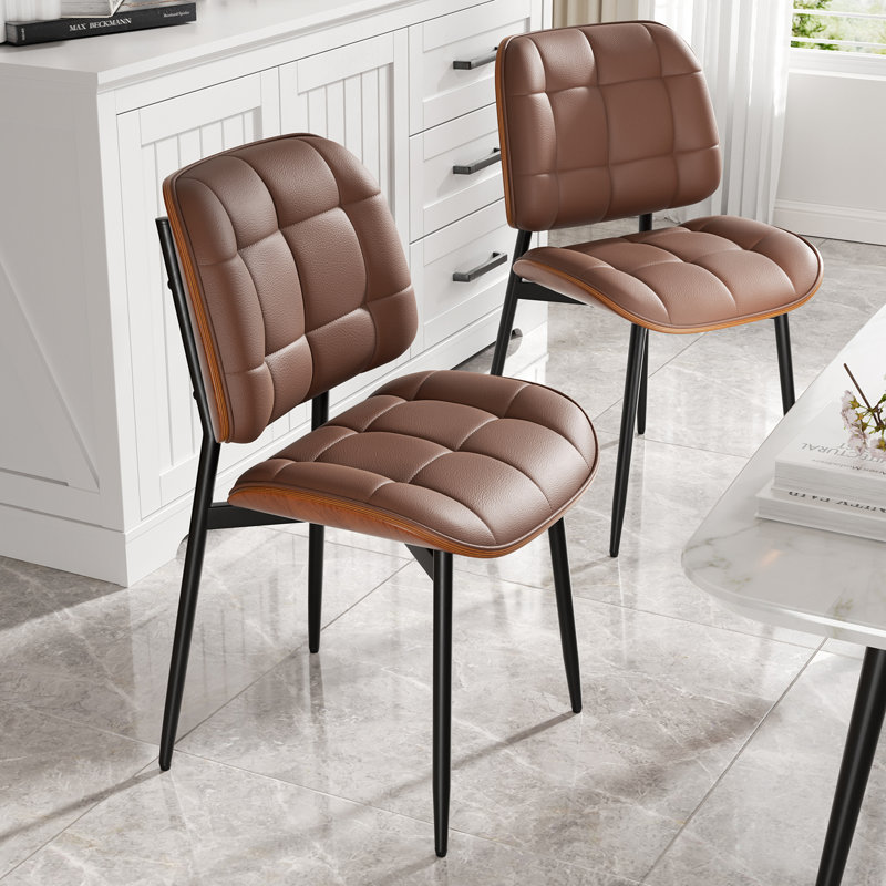 PU Leather Upholstered Dining Chairs With Stitched Detailing And Soft Padding - Perfect Side Chairs For Dining Rooms, Kitchens, And Living Rooms.