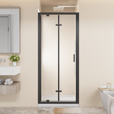 Porte de douche pivotante pliante avec cadre 32 po x 72 po peu encombrante, verre trempé transparent de 1/4 po avec poignée en acier inoxydable, installation réversible, noir