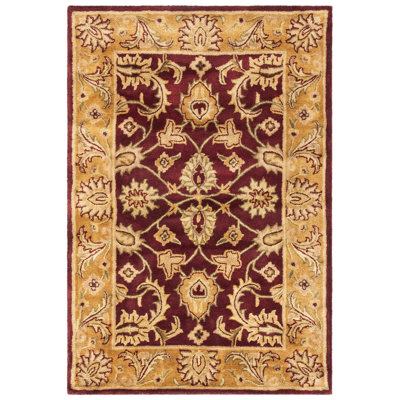 Tapis bourgogne / doré en laine touffeté à la main Bromley
