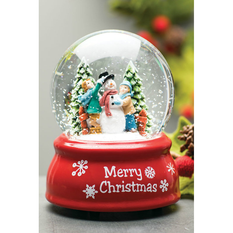 Bonhomme de neige dans une boule neigeuse musicale