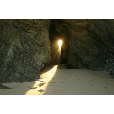 A Little Bit Of Sunlight Shining Through The Rocks by Estima - Wrapped Canvas Print