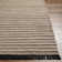 Crumrine Solid Color Handmade Flatweave Polyester Area Rug in Brown