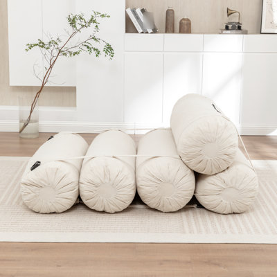 Plancher réglable en velours côtelé beige avec 5 coussins cylindriques pour différents besoins de détente dans la salle de jeux et les petits espaces de lecture, salon, chambre à coucher