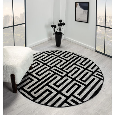 Tapis gris à motif géométrique abstrait