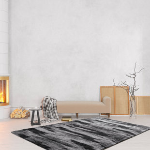 Tapis à poils longs moelleux et moderne à motif abstrait moderne