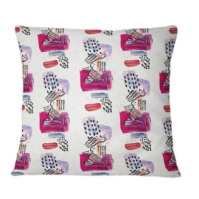 Coussin décoratif à motifs bleus et noirs rétro sur fond blanc
