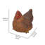 Statue de poule accroupie