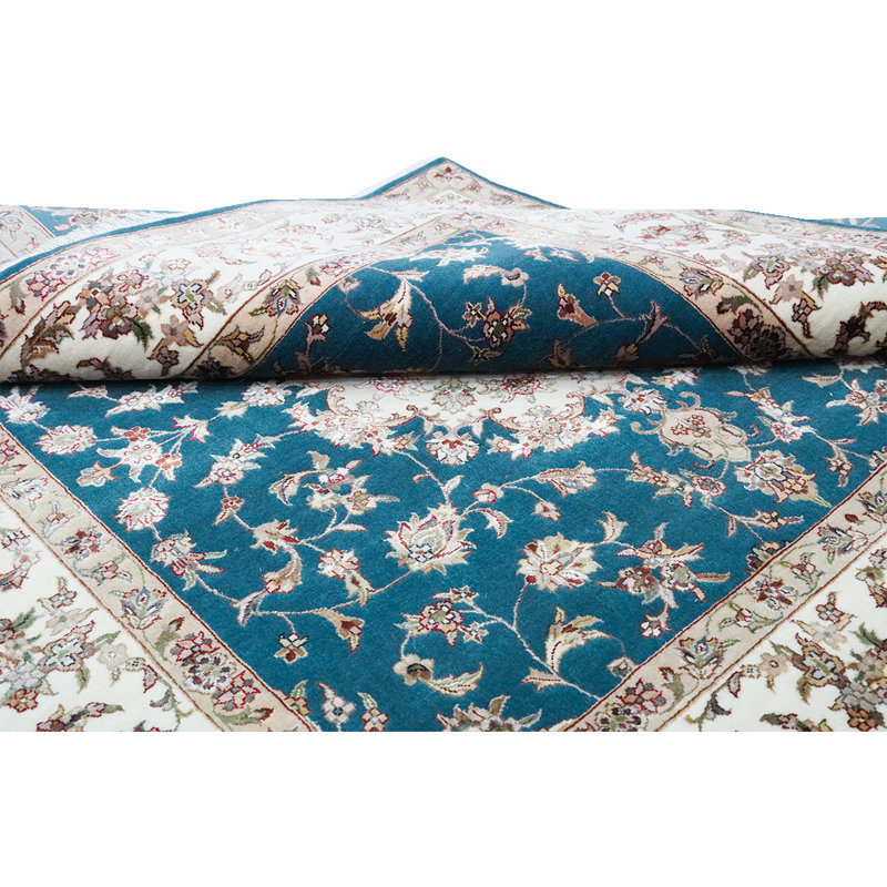 Tapis turquoise et ivoire noué à la main de haute qualité