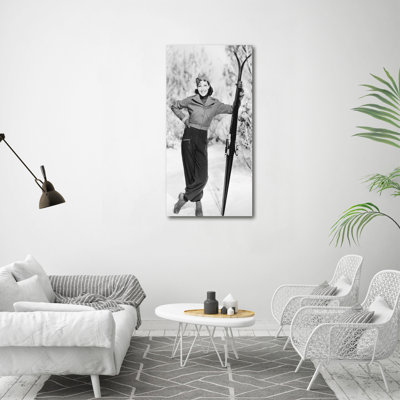 Woman With Skis - Wrapped Canvas Print