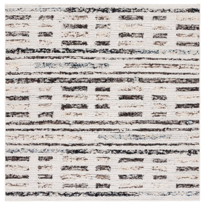Ihechikara Hand Woven Wool/Cotton Striped Rug in Ivory/Dark Brown