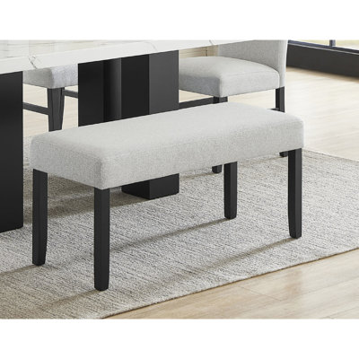 Banc contemporain gris avec siège, tissu neutre doux, finition foncée pour les pieds de la salle à manger et la pièce en tissu, style