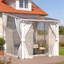 Pergola blanche avec toit rigide et abri de jardin avec rideaux et moustiquaire-123829708