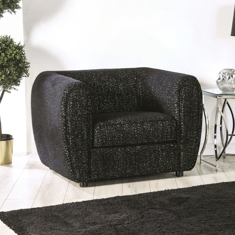 Fauteuil à dossier bas avec coussin carré noir