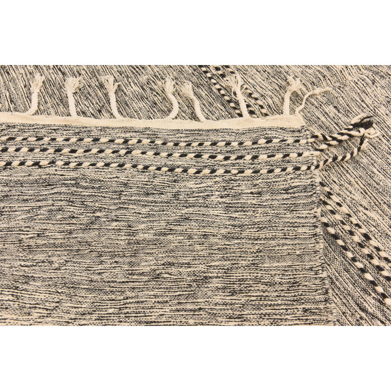 Tapis noir et blanc Orpheus