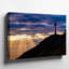 Toile, "Dramatic Sunset Scene Doting A Large Silhouetted Cross Atop", art mural sur une colline accidentée entourée d'un paysage vibrant-1299032699