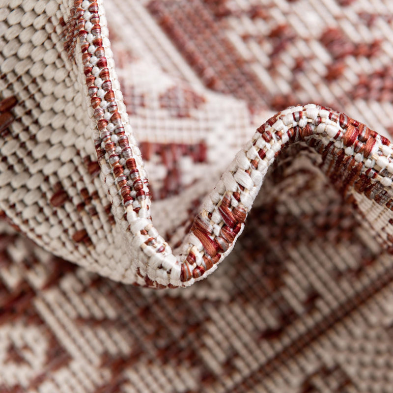 Archange Southwestern Machine Woven Polypropylene Indoor / Outdoor Area Rug in Rust Red, Rectangle 7' x 10'