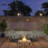 Bitner 28 Inch Round Outdoor Propane Fire Pit Wood-Like Surface with Laval Rock and Protect Cover