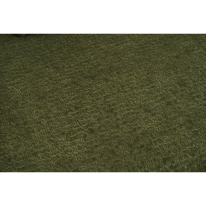Canapé incurvé moderne sans dossier avec dossier amélioré et revêtement en chenille pour une assise confortable dans des espaces compacts.